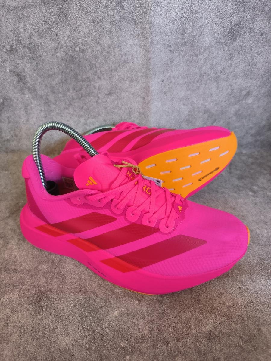 Adidas Adizero EVO SL berwarna merah muda (Shock Pink / Pure Ruby / Lucid Tangerine)