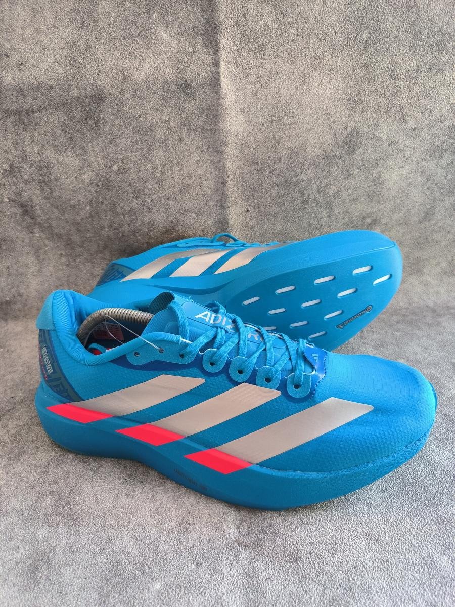 Adidas Adizero EVO SL Woven dalam warna Solar Blue / Silver Metallic / Lucid Red